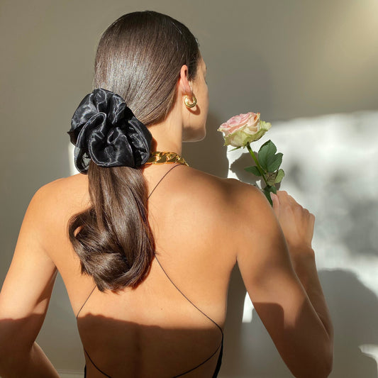 Anisa Sojka Black Oversized Hair Scrunchie, Gold Hoop Earrings, Chunky Chain Necklace 
